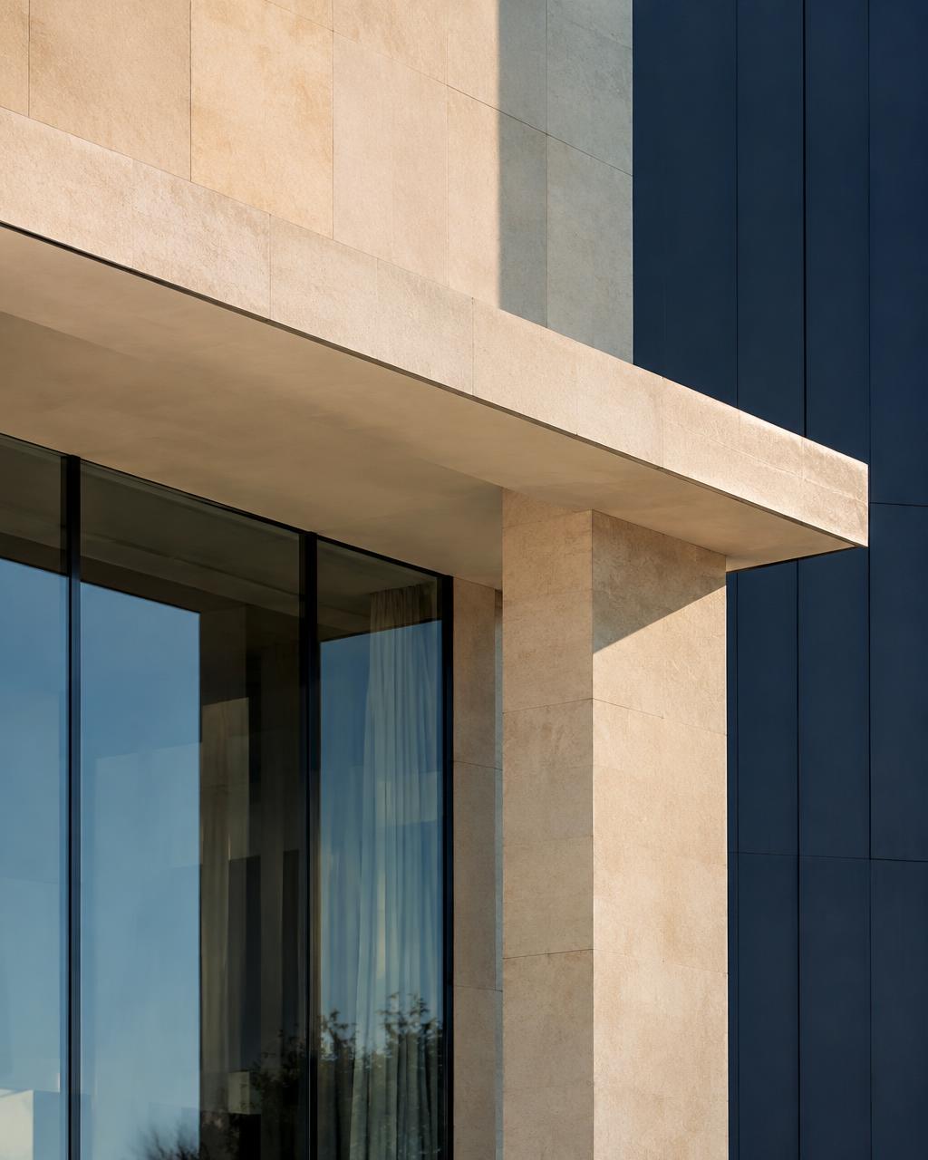 Stone and glass facade of a contemporary building